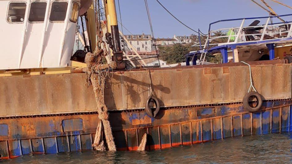 Anchor on the side of a fishing boat