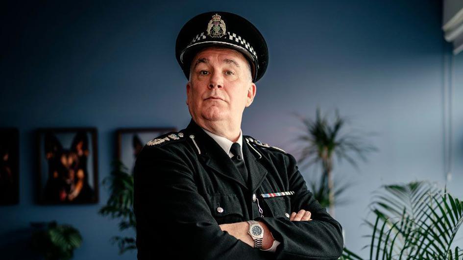 Jack Docherty plays Chief Commissioner Cameron Miekelson