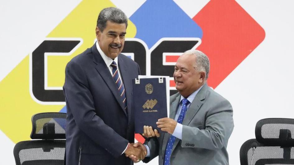 resident of Venezuela Nicolas Maduro (L) poses with the president of the National Electoral Council Elvis Amoroso during the delivery of the swear act of elected president in Caracas, Venezuela, 29 July 2024.