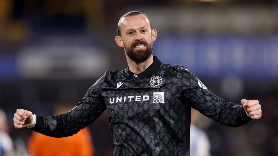 Steven Fletcher celebrates at Huddersfield 