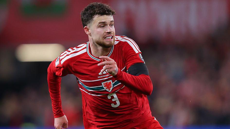 Neco Williams in action for Wales