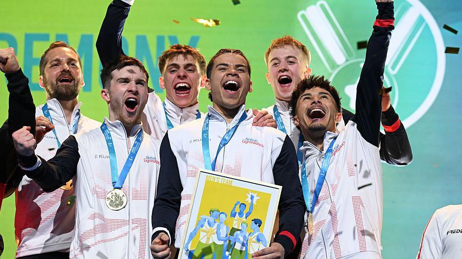 Great Britain's men celebrate winning gold