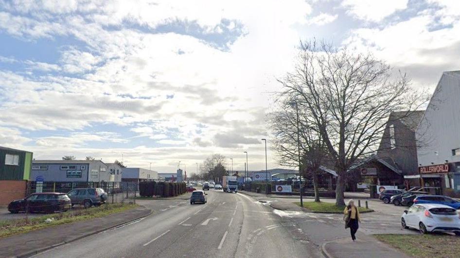 A general view of Mansfield Road in Derby, in an industrial area with a roller disco venue on the right.