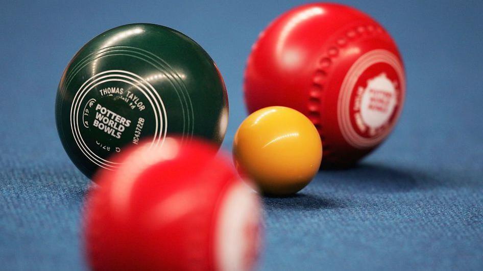 Bowls on a blue carpet