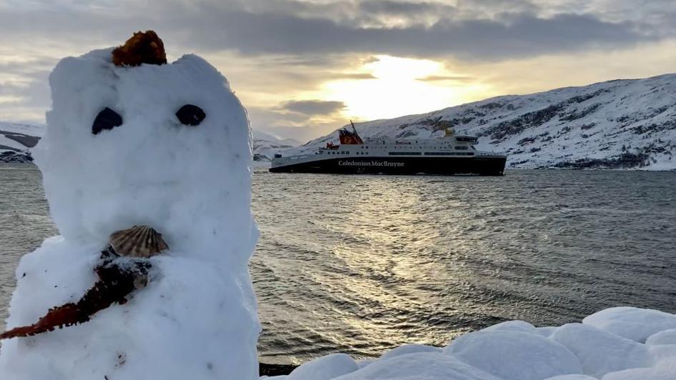 Snowman and ferry