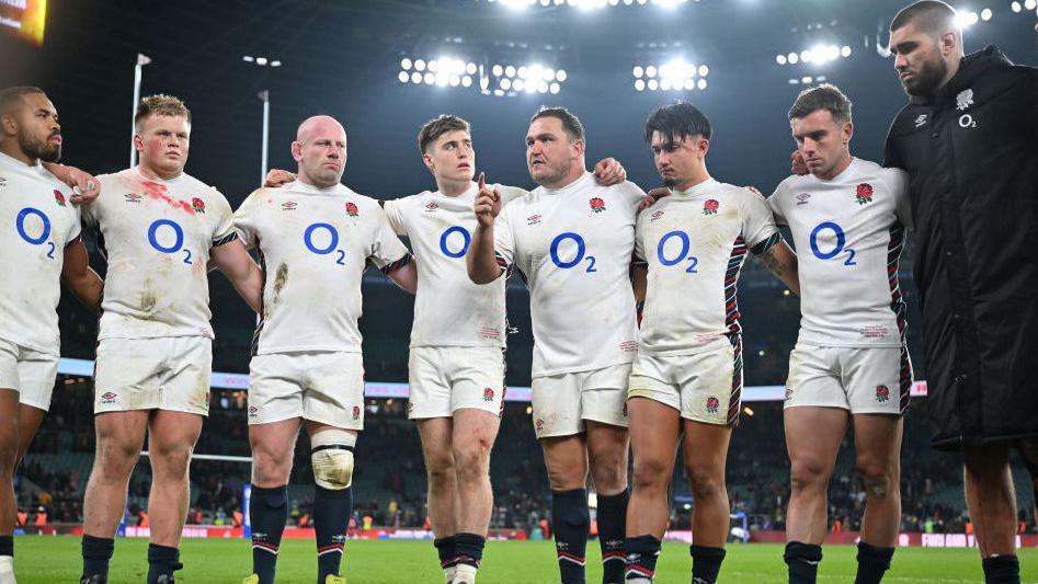 Jamie George talks to the England players after the final whistle