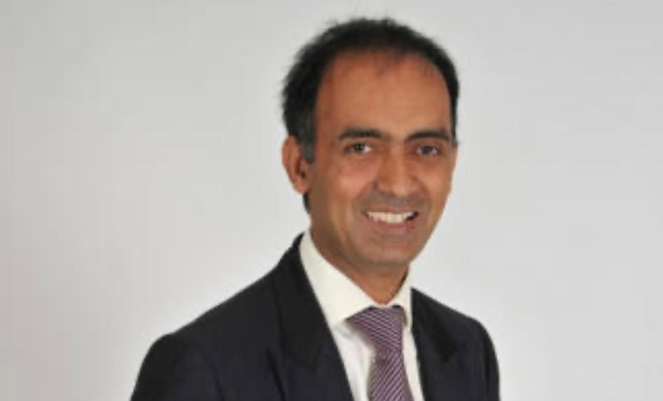 Profile picture of Mohammed Farooq wearing a black jacket and tie