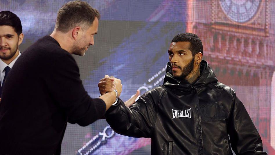 Eddie Hearn and Conor Benn shake hands