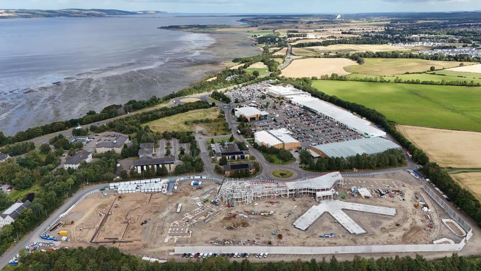 An aerial view of the HMP Highland construction site. The site is at the bottom of the image.