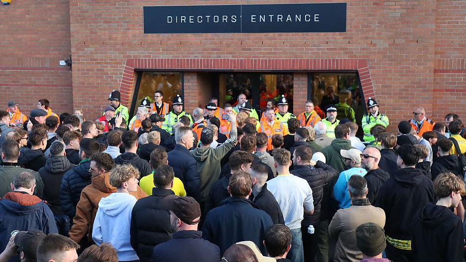 Norwich City fans protesting outside the directors' entrance at Carrow Road
