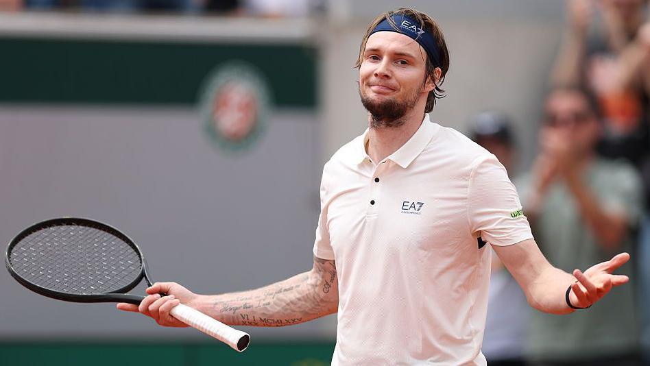 Kazakhstan's Alexander Bublik celebrates after coming back to defeat Alex De Minaur