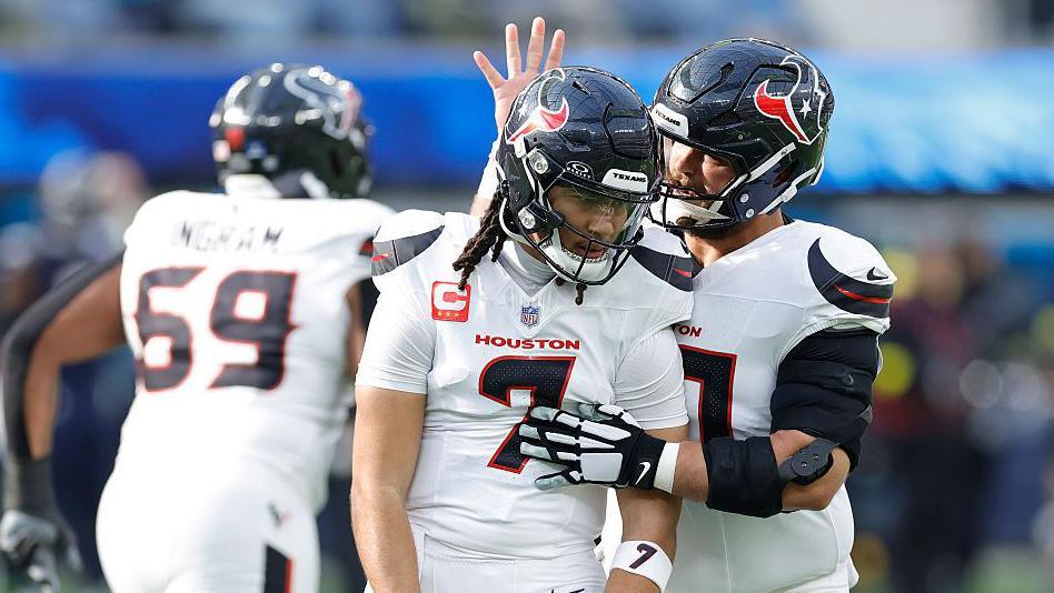 CJ Stroud celebrates a touchdown pass with Jake Andrews of the Houston Texans during the first quarter against the Los Angeles Chargers
