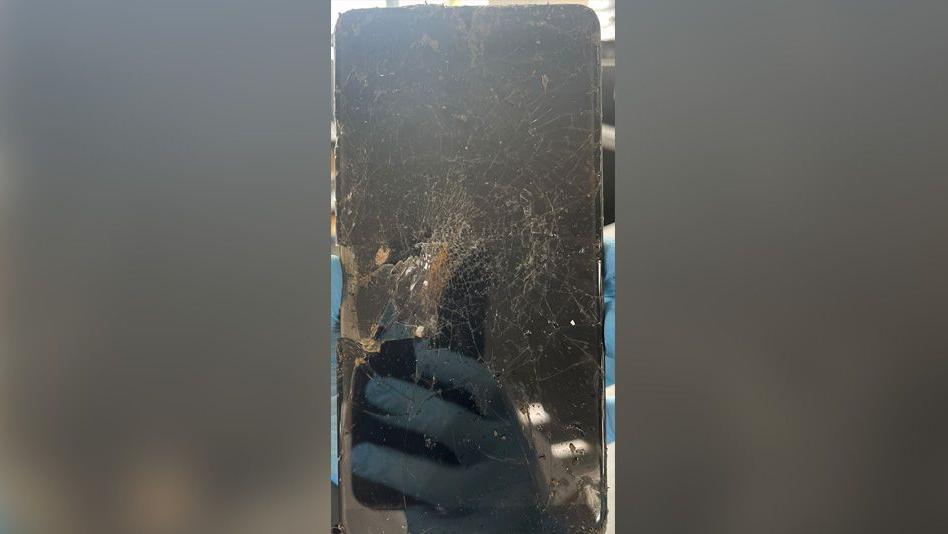 Smashed phone that was buried in the garden 