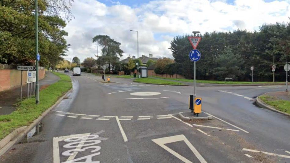 The junction at Holyport Road and the A308 Windsor Road, where there is a mini roundabout with three exits.