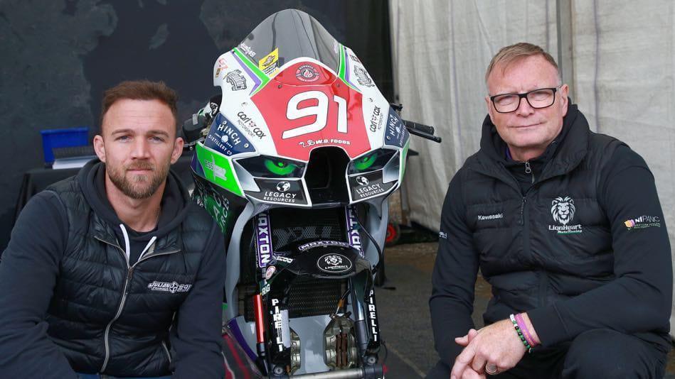 Rider Julian Trummer (left) and team owner Dwayne McCracken with the Kawasaki the Belgian will race at the Isle of Man TT