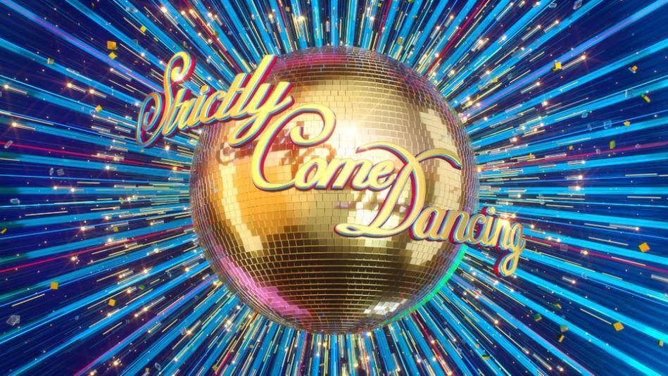 A gold glitterball with Strictly Come Dancing written in front of it.