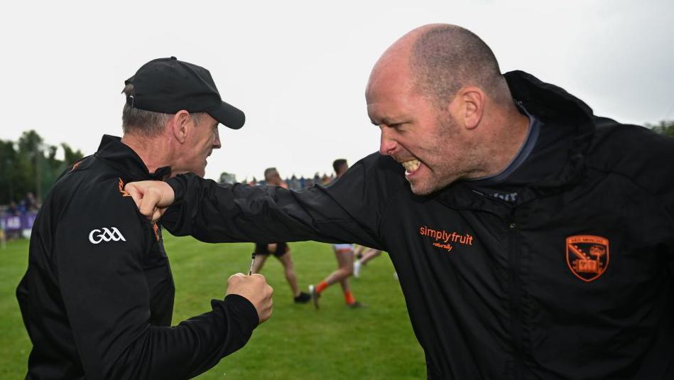 Ciaran McKeever and Kieran McGeeney celebrate last year's draw with Galway