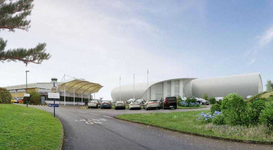 View from within airport boundary looking north across Gama Aviation car park to new facility