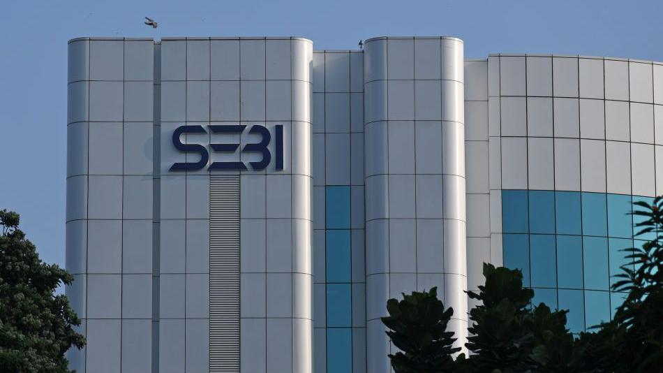 A Securities and Exchange Board of India (Sebi) logo is seen on the office building at the Bandra Kurla Complex business district in Mumbai.