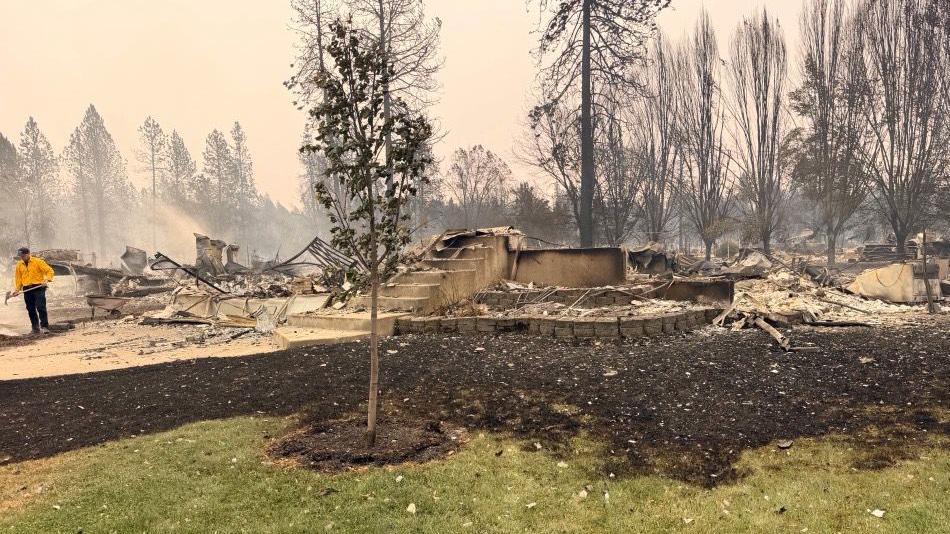 A view of Amy Mulligan's home in Spokane a day after a wildfire took hold of her neighbourhood 