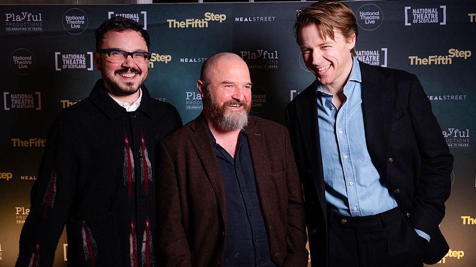 Director Finn den Hertog, writer David Ireland, and Jack Lowden on the red carpet at the global premiere of "The Fifth Step" in Edinburgh on Tuesday