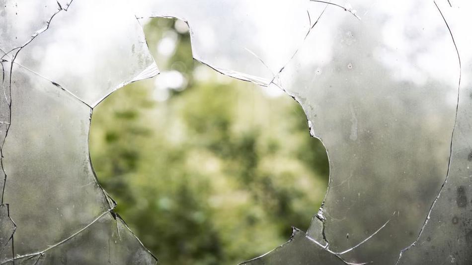 Stock image of a broken window
