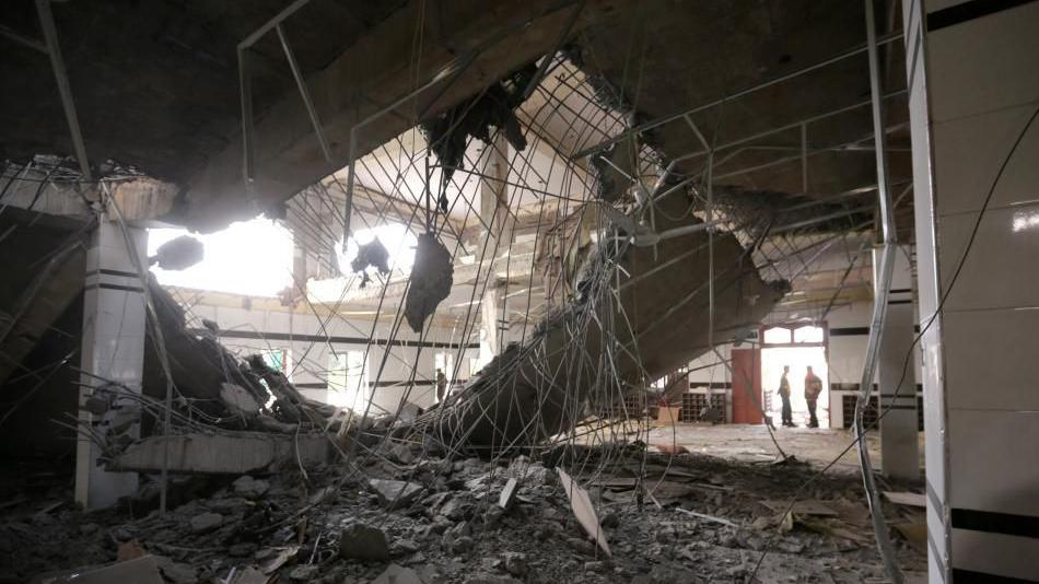 The view from inside a building damaged in a missile strike