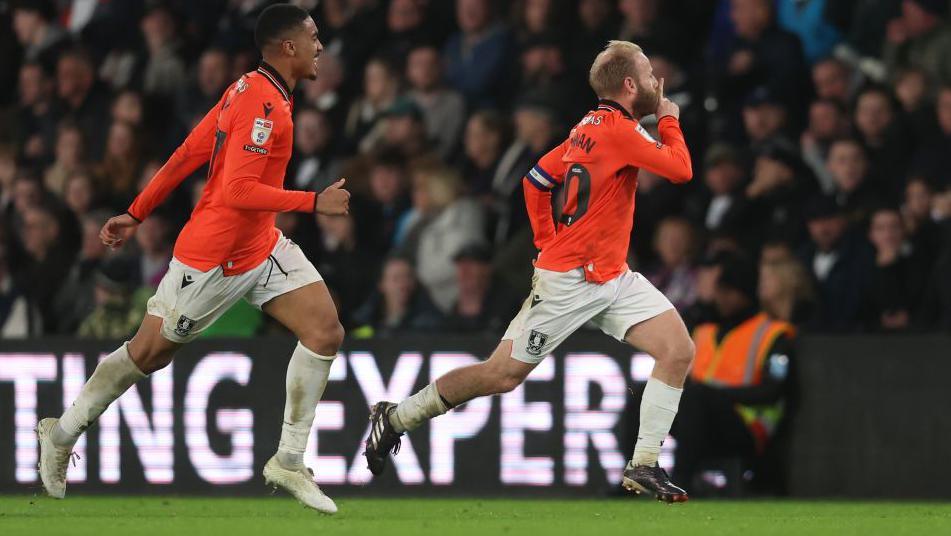 Barry Bannon celebrates scoring a wonder goal