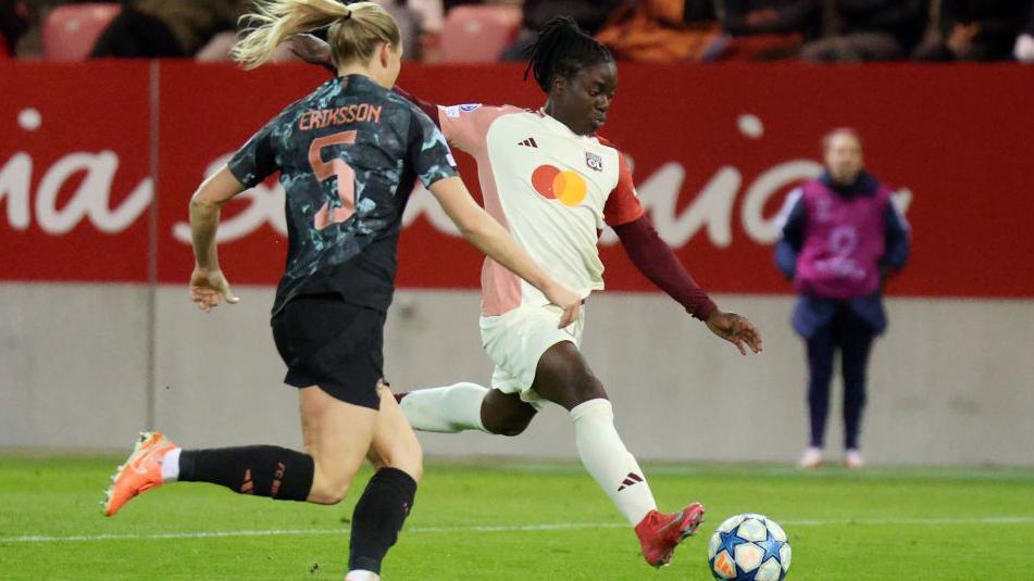 Chawinga shapes to shoot at goal before scoring the opener against Bayern Munich