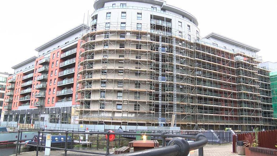 The exterior of Mackenzie House on Chadwick Street, covered in scaffolding.