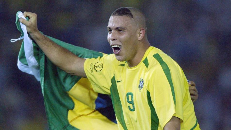 Ronaldo celebrates after helping Brazil win the 2002 World Cup