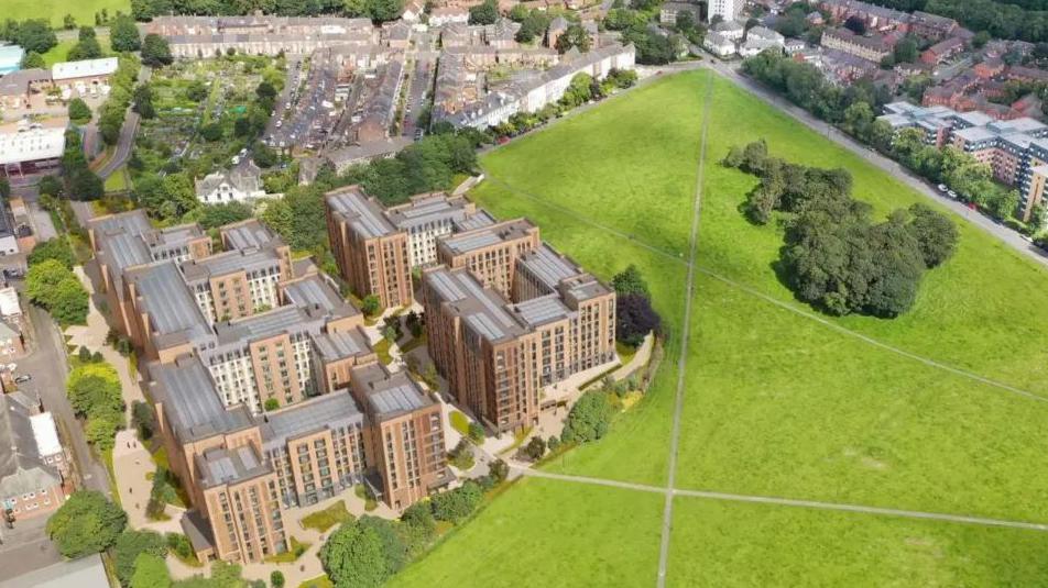 Artist's impression of how Newcastle University's new student accommodation in Spital Tongues will look. The CGI is pictured from above showing a tightly packed series of red brick high-rise blocks in a corner of open parkland.