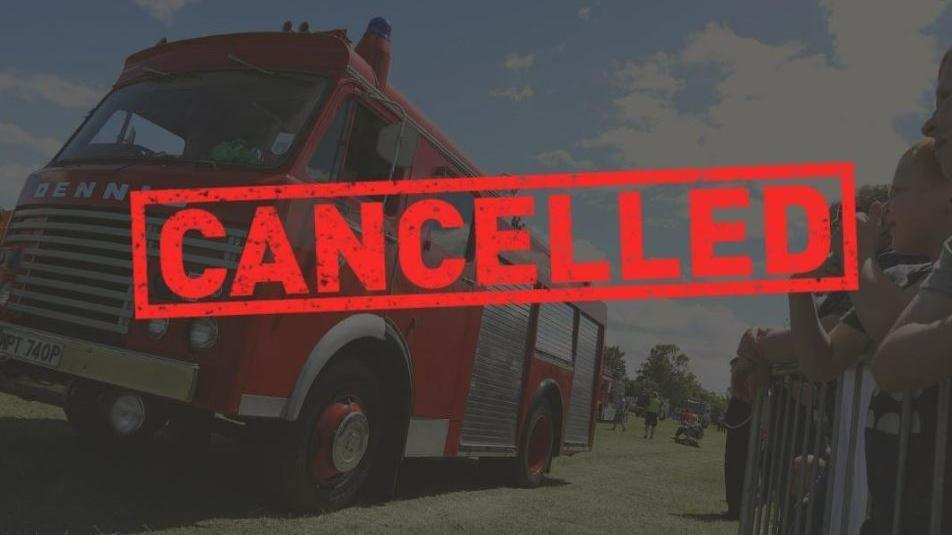 Fire engine at show with word cancelled edited on