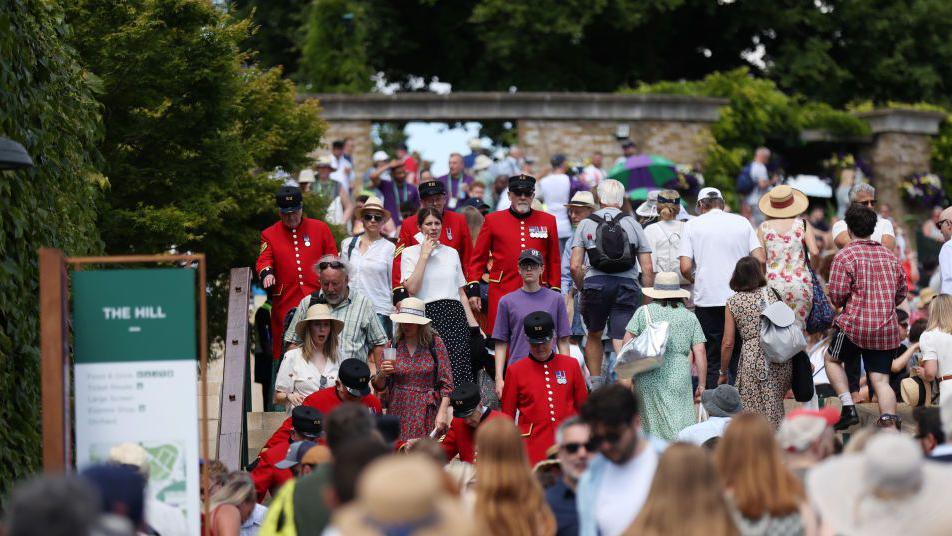 Chelsea Pensioners in the crowds at Wimbledon 2022.
