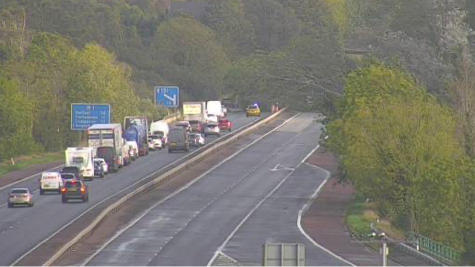 The M1 Tamnamore Jct 14 is closed in both directions, there is a tailback of cars.