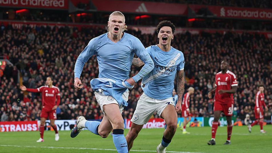 Erling Haaland celebrates his 93rd minute winner at Anfield