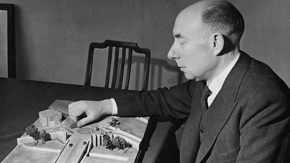 Arthur Elvin inspecting a model of the new roads being built at Wembley about 1947 