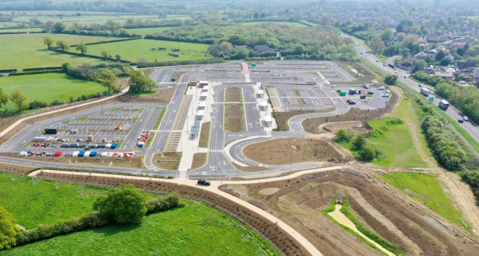 Eynsham park and ride, which is just a large tarmacked area, with parking spaces marked out, but completely empty. On it's right hand side is the A40 road, which it is not connected to.