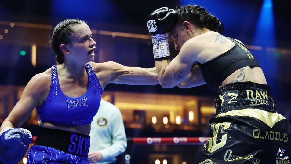 Skye Nicolson lands a left hook on Raven Chapman