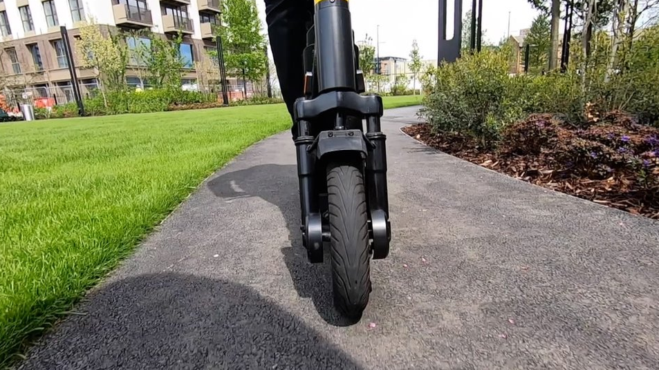 Someone riding an electric scooter