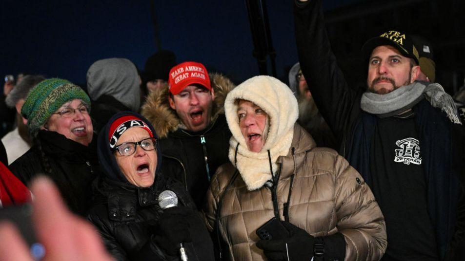 Supporters of incarcerated January 6 rioters including the mother of Ashli Babbitt (2nd R) rally, outside a prison