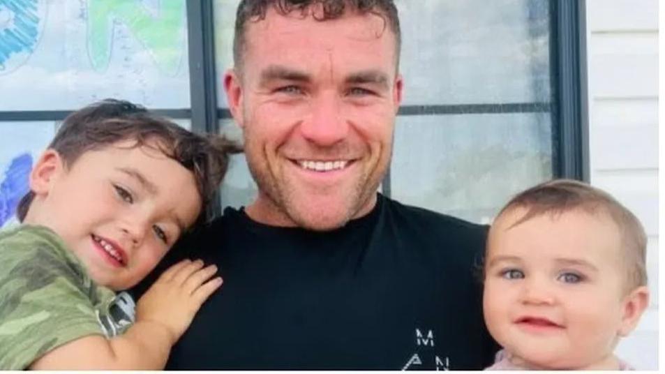 Matthew Syron with his two children