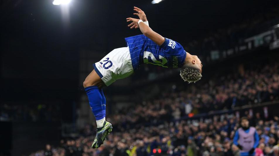 Ipswich Town's Omari Hutchinson celebrates his goal with a backflip