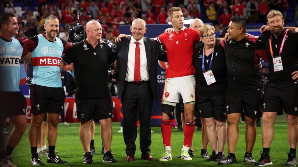 Warren Gatland in a team huddle after Wales beat Australia in the Rugby World Cup