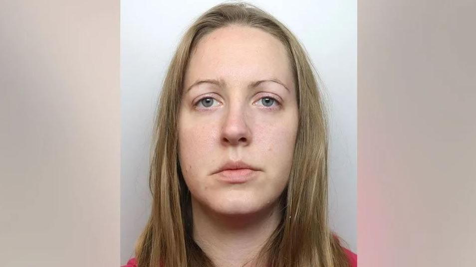 A police mugshot of Lucy Letby, who has straight blonde hair and looks into the camera with a blank expression. 