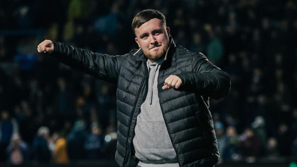 World darts champion Luke Littler is presented to the Warrington crowd before kick-off