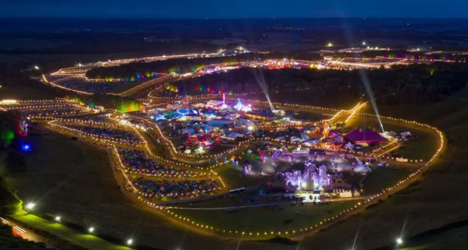 Aerial view of the festival at night in lights