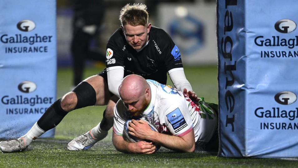 James Chisholm touches down for the opening try