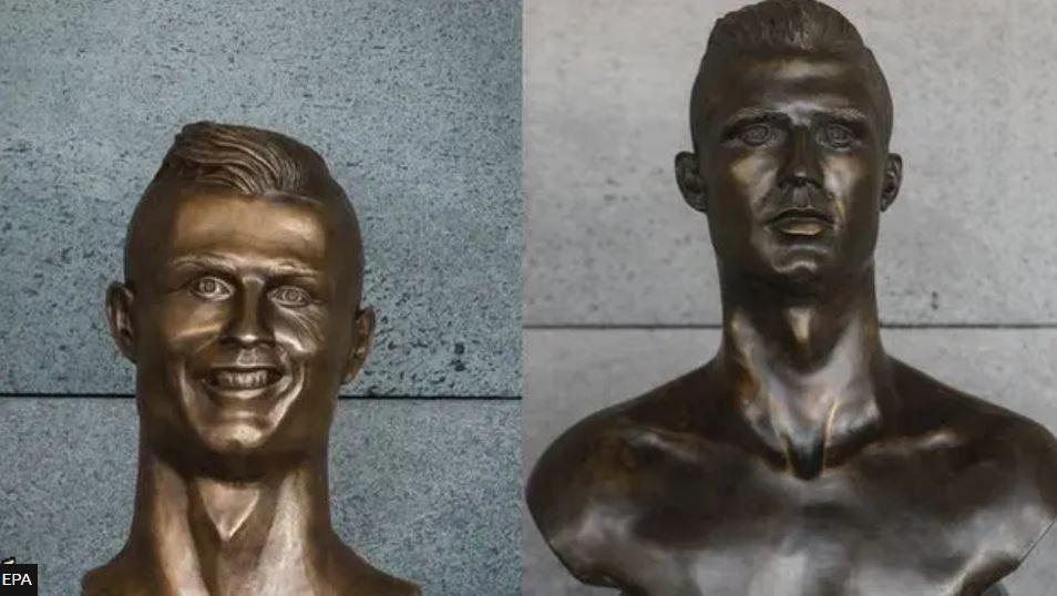 Two statues of Ronaldo side by side