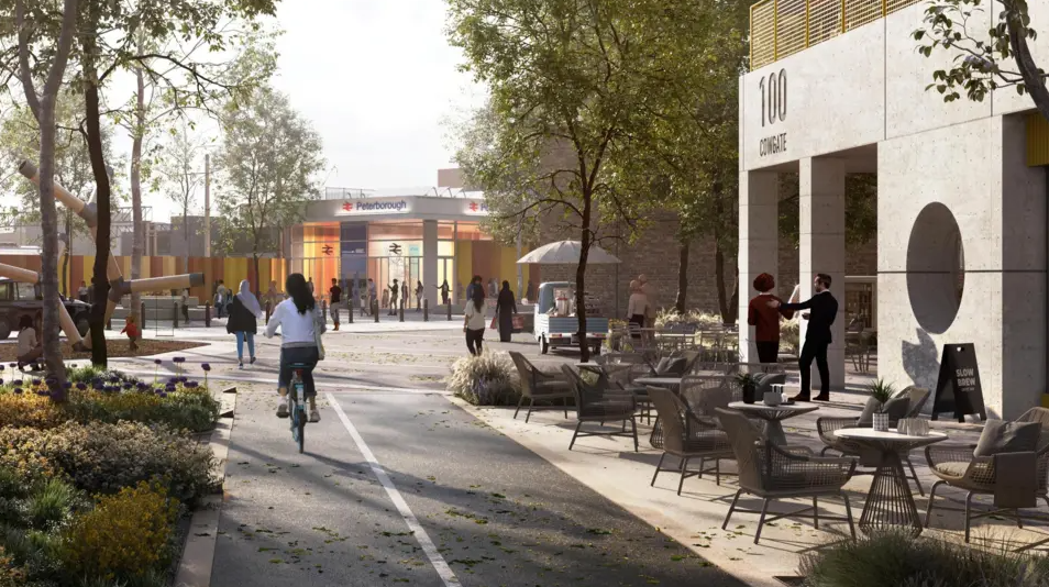 Artist impression of the train station - with a cycle and walking path, a person cycling toward the station and a cafe with outdoor seating on the right.